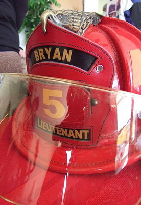 Image: The front of Lieutenant Greg Pickard’s fire helmet was on display during the visitation.