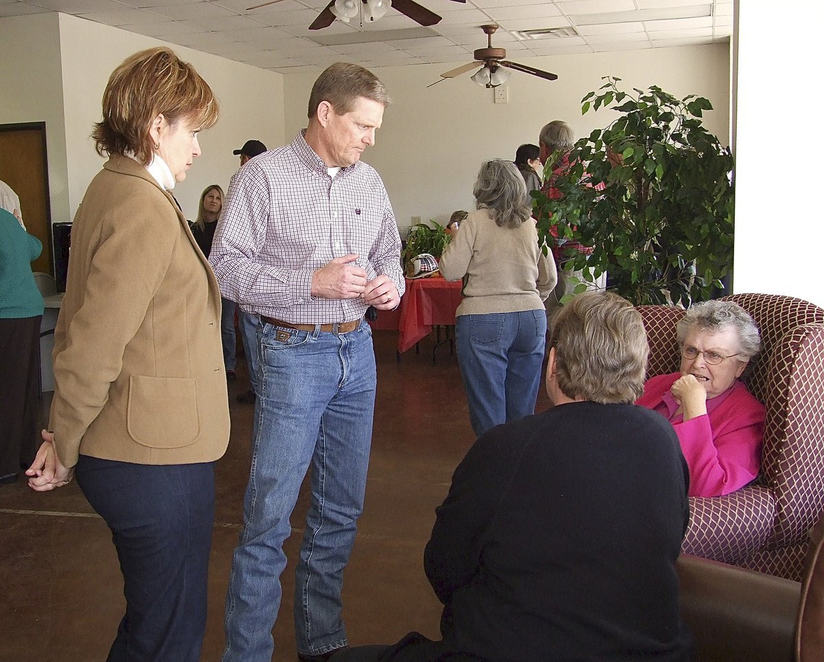 Image: Guests visit while thinking of Greg during the visitation held in his honor.