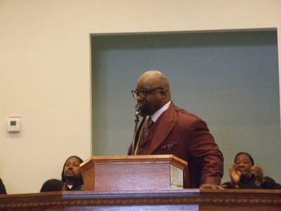 Image: Pastor Dixon gave thanks to everyone who contributed their time, labor and monetary gifts to the building project.