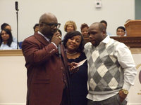 Image: Pastor Preston E. and First Lady Kechia Dixon with son, Quinston, during the Entrance Ceremony at Mt. Gilead.