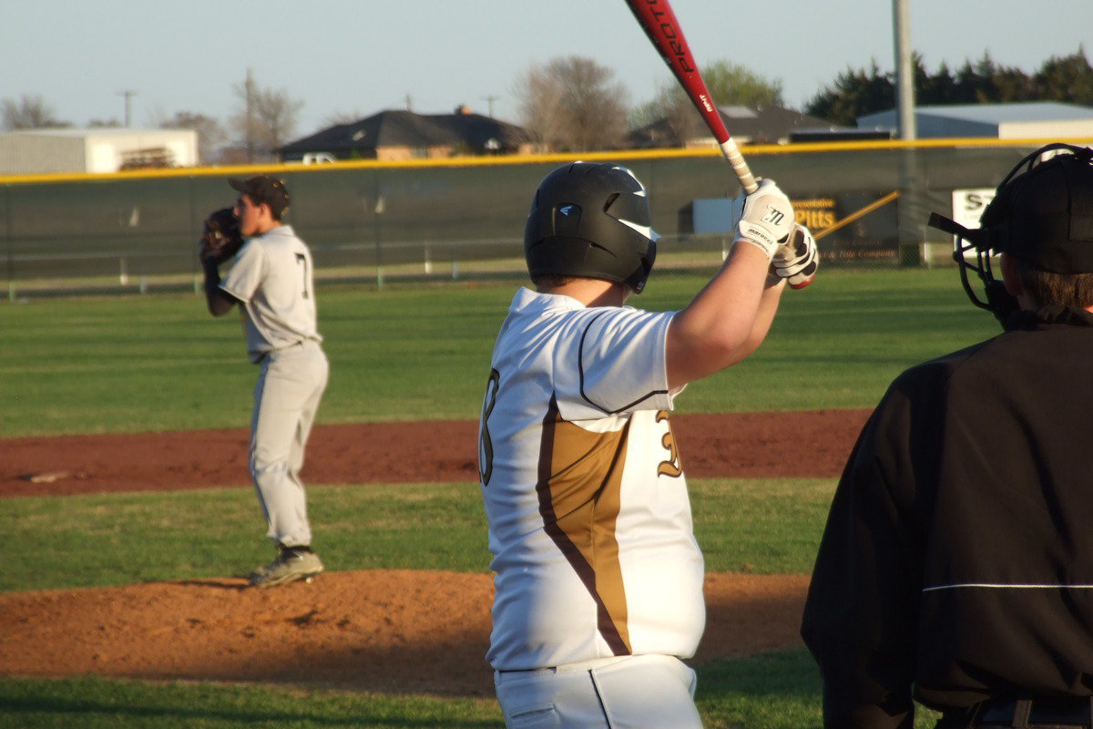 Image: John Byers(18) stoically awaits Itasca’s pitch.