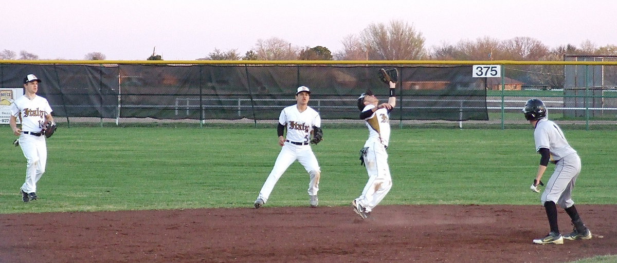 Image: Italy’s Center fielder Chase Hamilton(10) and second baseman Reid Jacinto(5) backup shortstop Caden Jacinto(2) as he attempts to catch a pop-up.