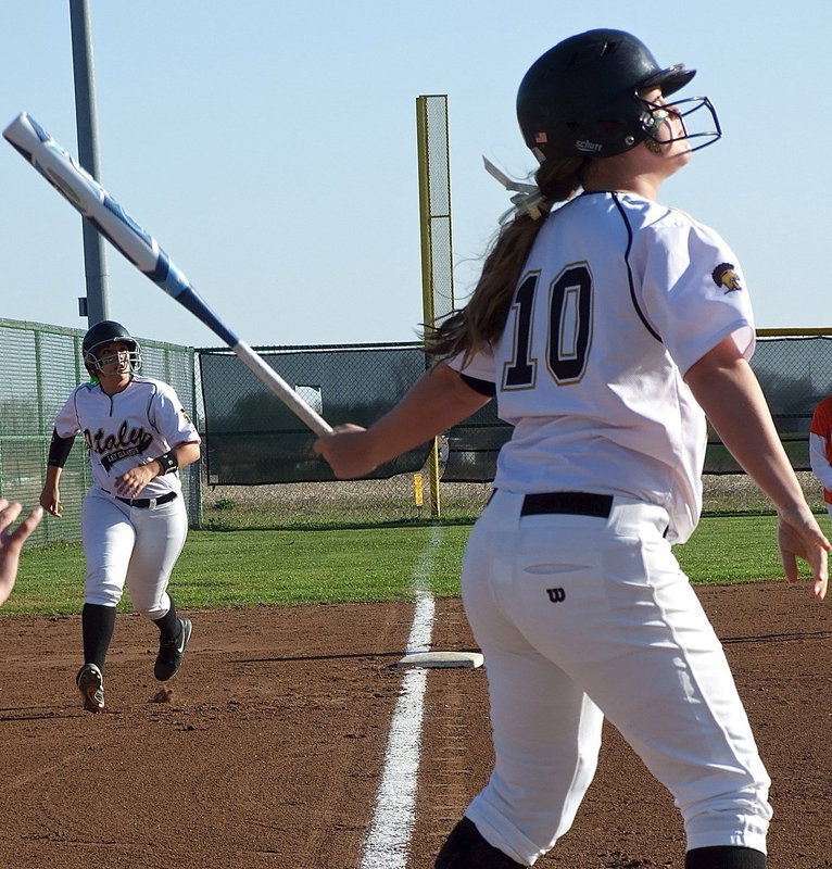 Image: Paige Westbrook(10) battles at the plate in an effort to score teammate Alyssa Richards(9) from third base.