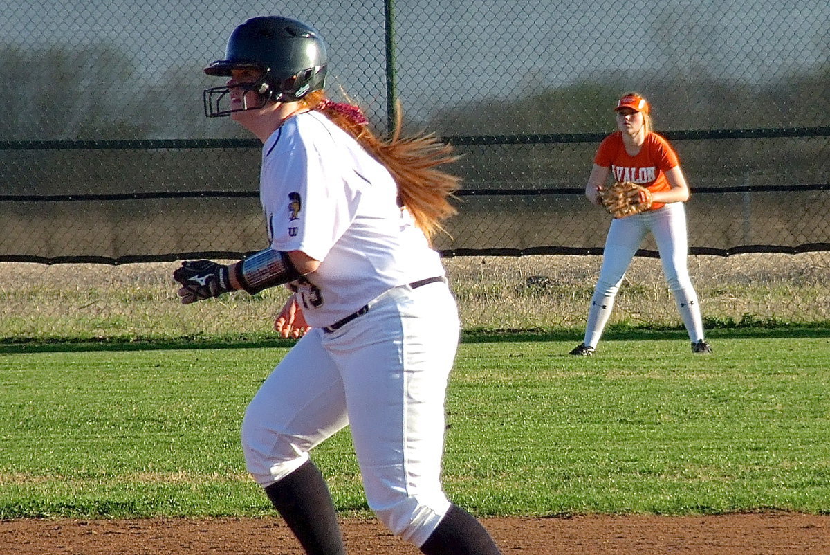 Image: Lady Gladiator Katie Byers(13) heads from second to third base.