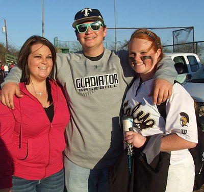 Image: Former Lady Gladiator first baseman, Lauren Byers, poses with both her little brother, John Byers, currently a third baseman for the Italy Baseball team, and with current Lady Gladiator first baseman, and little sister, Katie Byers(13), after Italy’s 15-0 win over Avalon.