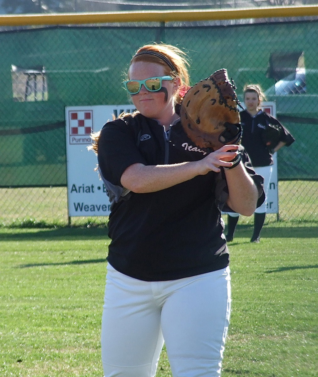 Image: Lady Gladiator Katie Byers warms up before the battle between Italy and Avalon.