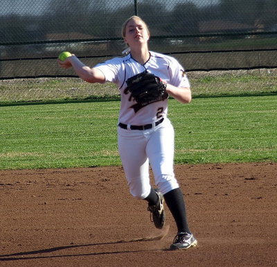 Image: Madison Washington(2) shows her skills at shortstop.