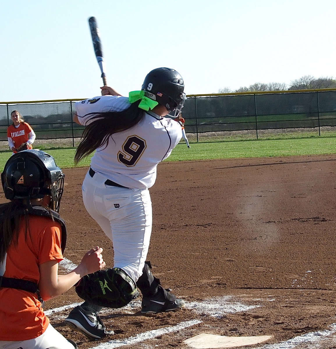 Image: Poof! Alyssa Richards(9) fires a shotgun blasting hit in the direction of the Avalon Lady Eagle’s defense.