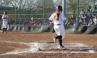 Image: Katie Byers(13) scores from third base for Italy.