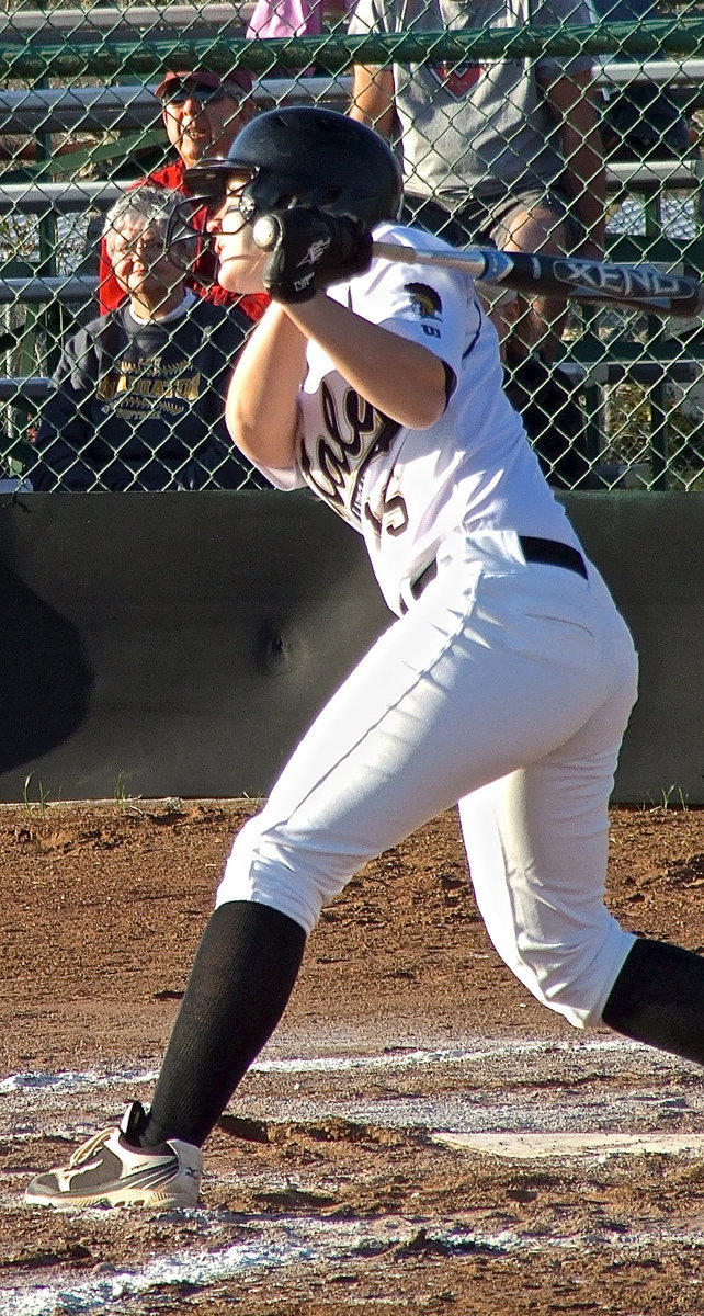 Image: Jaclynn Lewis(15) advances the runners during a one-sided matchup against Avalon.