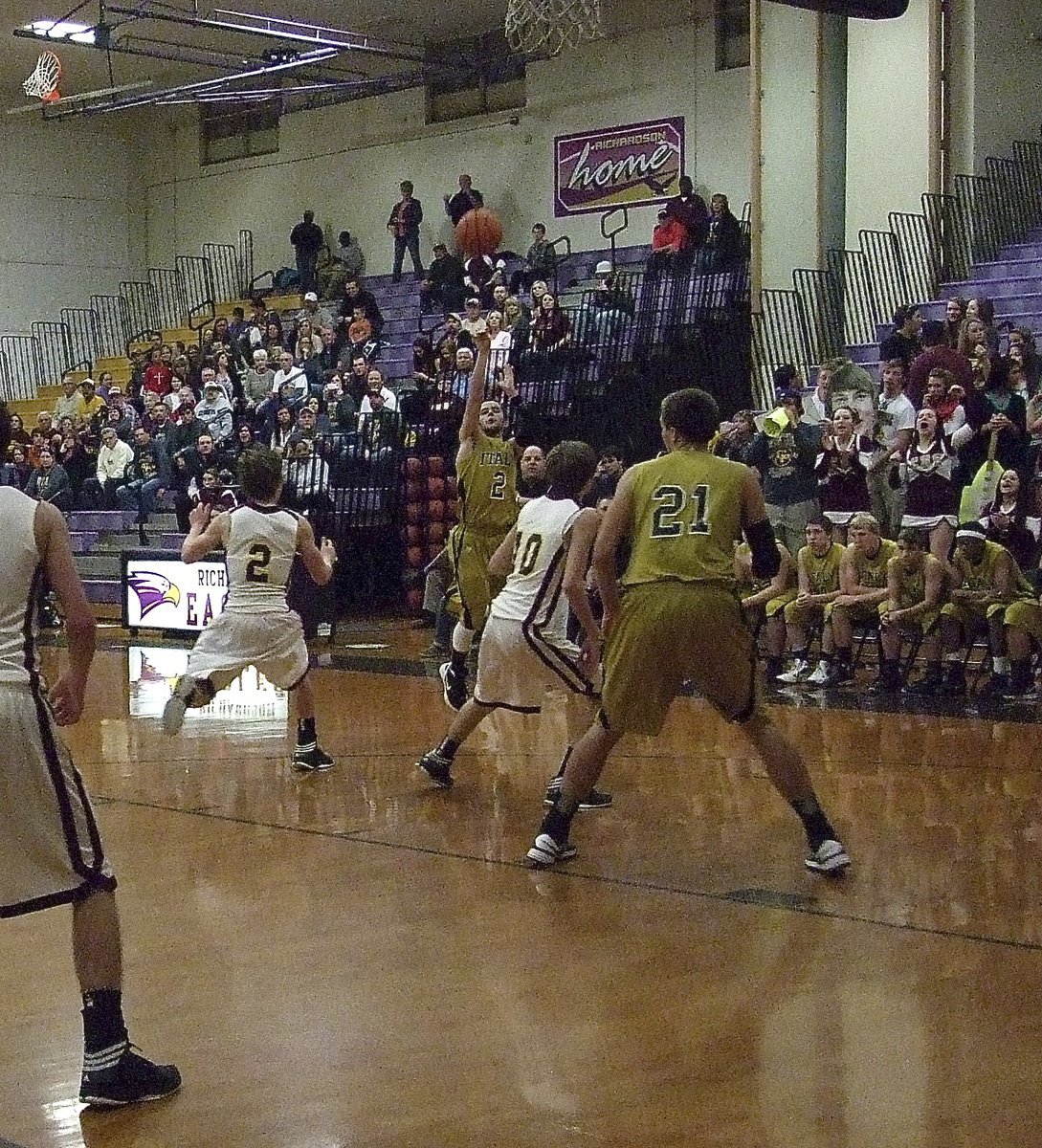 Image: Senior Gladiator Caden Jacinto(2) was hot from the 3-point line against Collinsville early.