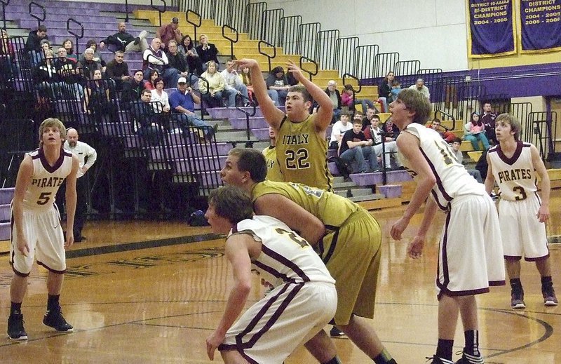 Image: Italy’s Zain Byers(22) attempts a 3-pointer for Italy during the bi-district matchup against Collinsville.