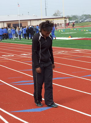 Image: Kortnei Johnson gets in the zone before the meet.