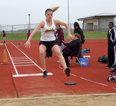 Image: Freshman, Halee Turner flies to a 4th place finish in the triple jump.
