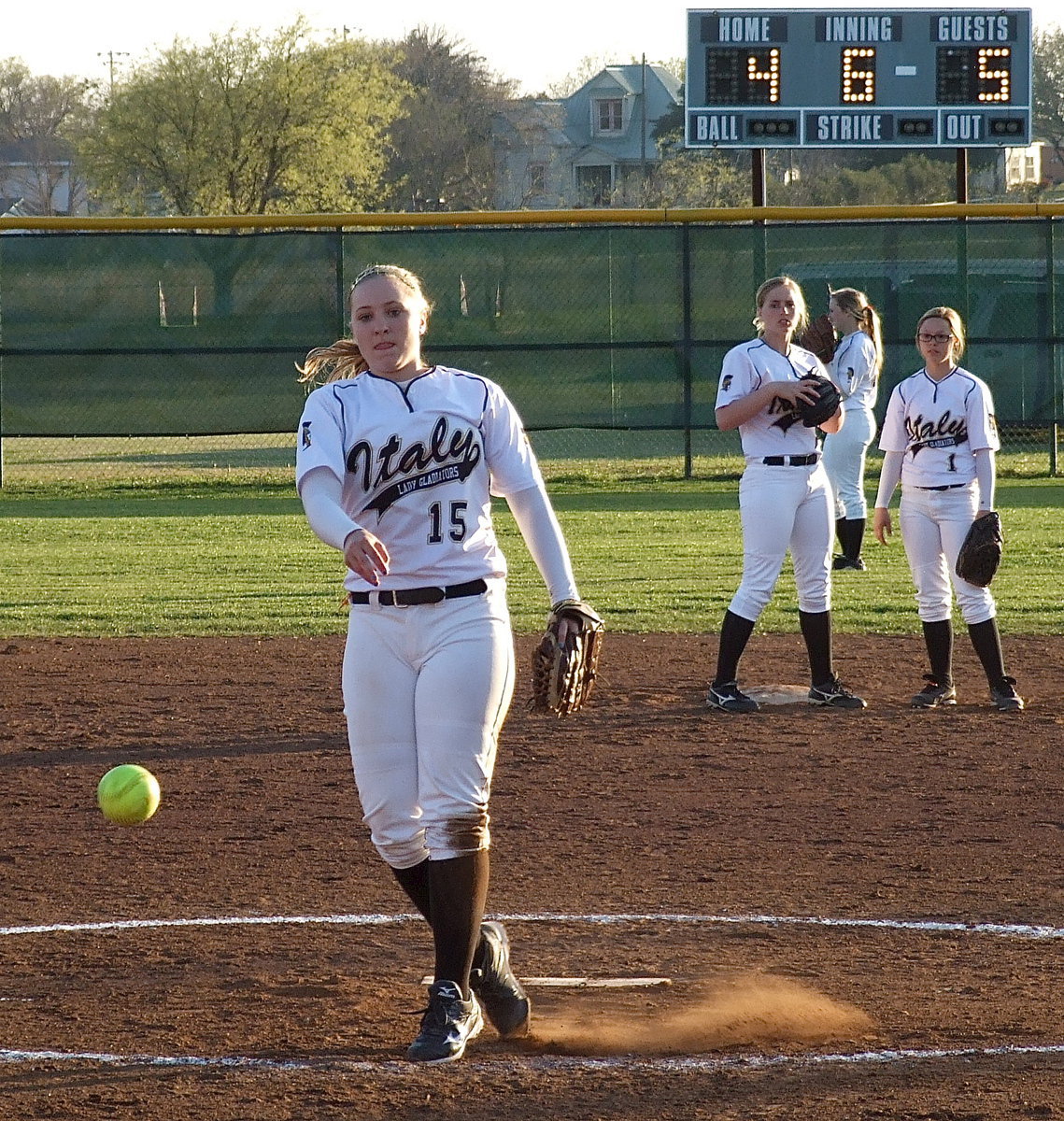 Image: Jaclynn Lewis(15) returns to the mound for Italy with the tension mounting in the late innings.