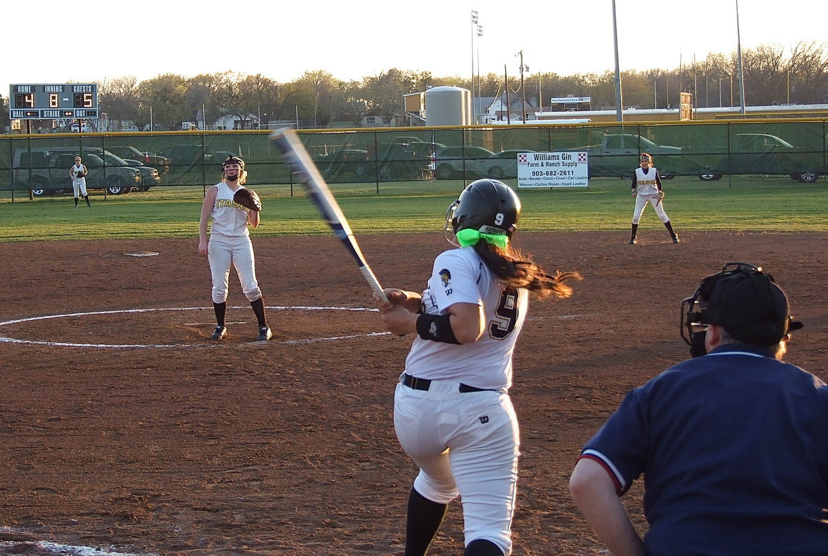 Image: With Italy taking what could be their last at bat and two strikes against her, Alyssa Richards(9) hits a monster shot over the left field fence to tie the game 5-5 with no outs. The out-of-the-park homerun marks the third homer for Richards this season.