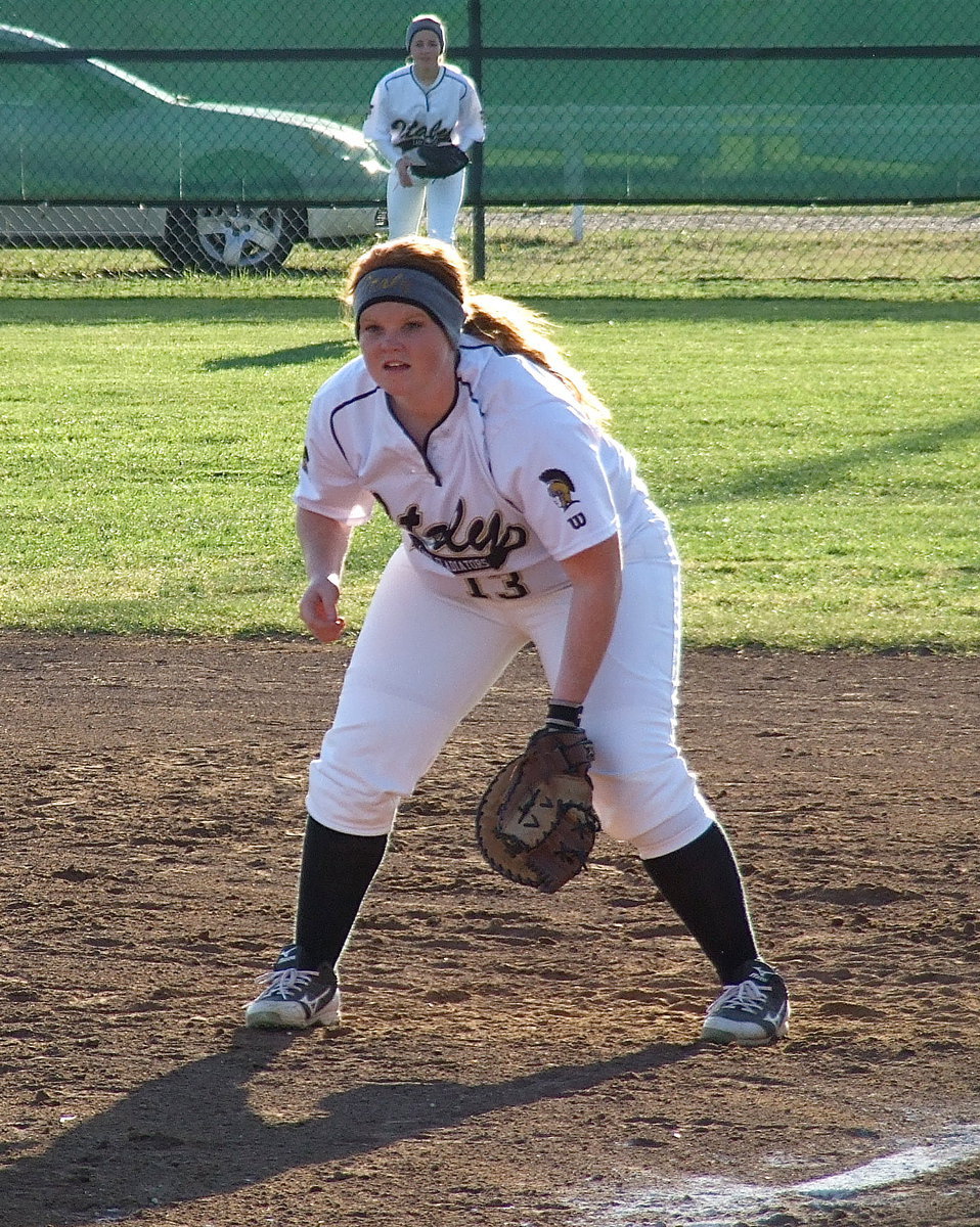 Image: First baseman Katie Byers(13) and right fielder Britney Chambers are ready to make a play.