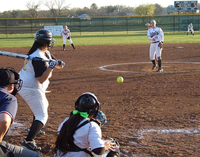 Image: Lady Gladiator Jaclynn Lewis(15) delivers a strike to catcher Alyssa Richards(9).