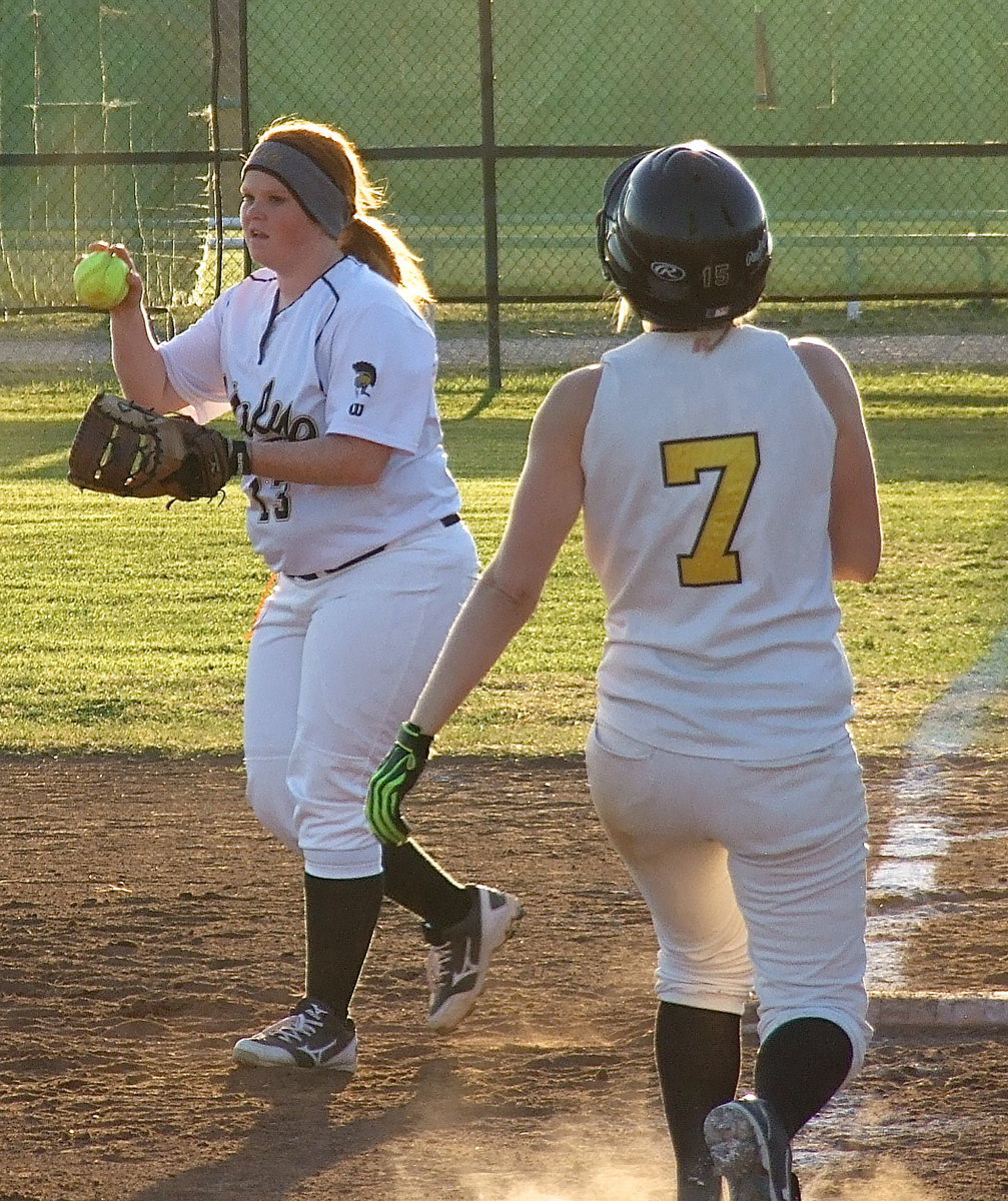 Image: Senior first baseman Katie Byers(13) collects an out at first base for Italy.