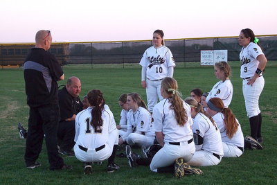 Image: Coach Rowe congratulates his players after the Lady Gladiators showed heart against a determined Itasca team.