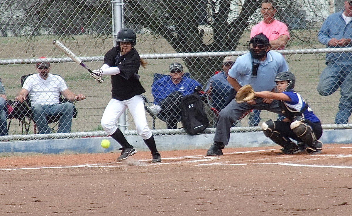 Image: Slapper Bailey Eubank connects against the Lady Polar Bears as the game heats up early in Frost.