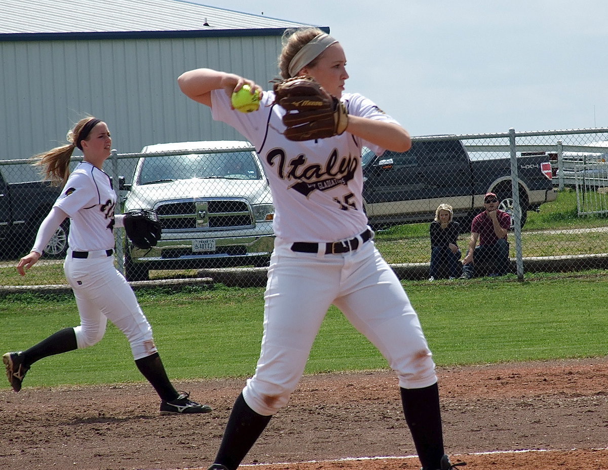 Image: Also covering a bunt for an Italy out is Jaclynn Lewis(15) with shortstop Madison Washington(2) backing everything up.