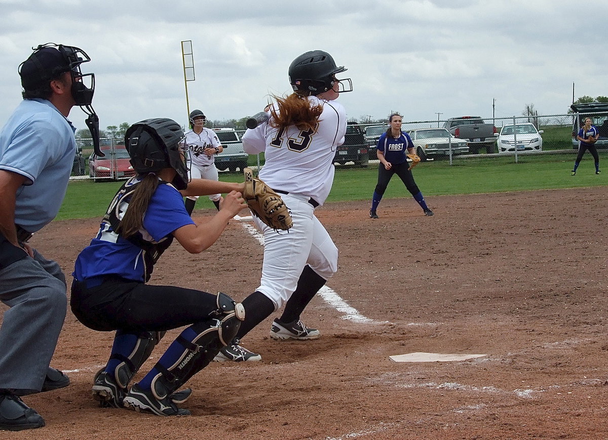 Image: With two outs, senior Katie Byers(13) makes something happen when her pop fly to right field is caught in foul territory allowing Alyssa Richards to score from third base and tie the game 5-5.