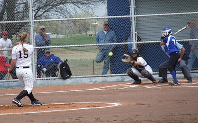 Image: Jaclynn Lewis(15) pitches to catcher Alyssa Richards(9) with Frost hoping to break the connection.