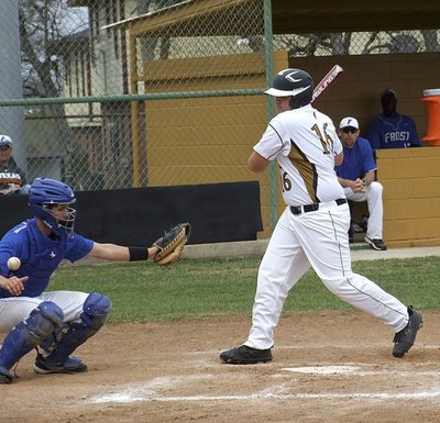 Image: Wear that! One size fits all!! Kevin Roldan(16) is hit by the pitch to take his base.