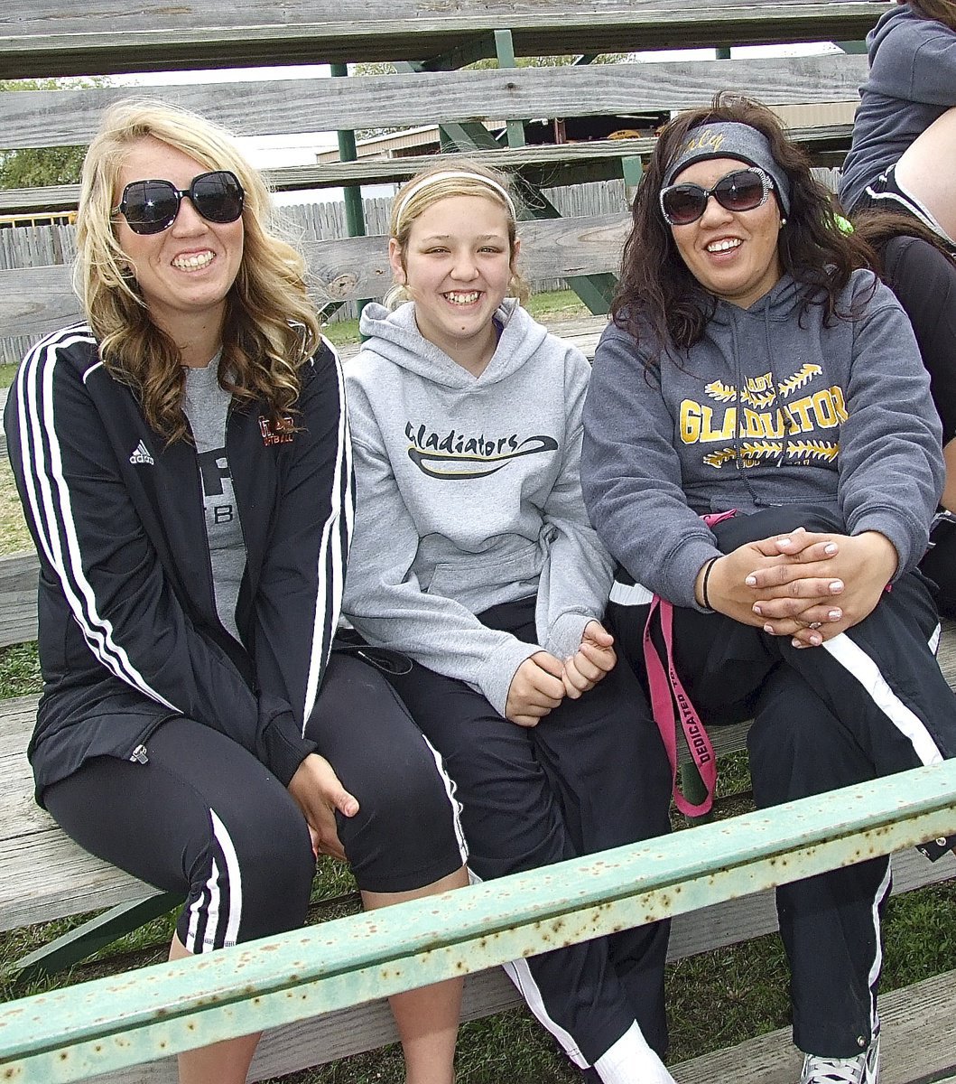 Image: 2012 IHS graduate and collegiate softball pitcher Megan Richards, in for a visit from college, enjoys Italy’s win over Frost with sister, “ChaCha” Richards, who is also a pitcher, and mother, Tina Richards who is a Lady Gladiator softball assistant coach.