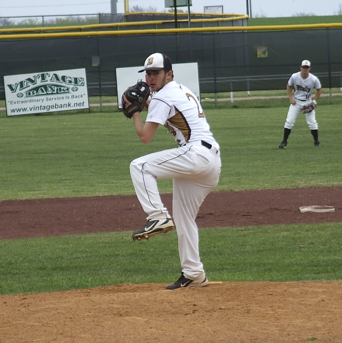 Image: Caden Jacinto(2) goes the distance for the win over Frost with center fielder Chase Hamilton(10) backing his senior classmate up.