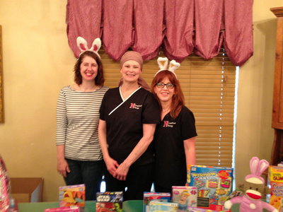 Image: These three occupational therapy students from Navarro helped join in the Easter fun volunteering their time to make sure everything went smooth.
