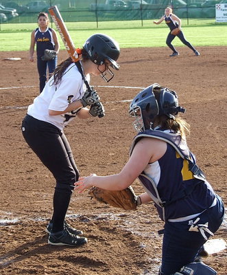 Image: Morgan Cockerham(8) lays off an inside pitch from Grand Prarie Advantage.