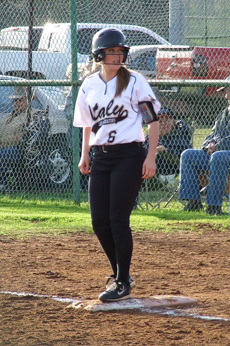 Image: Hannah Washington(6) gets on base with a single.