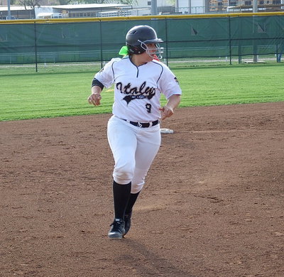 Image: Alyssa Richards(9) runs to third base.