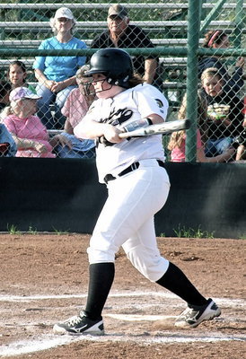 Image: Katie Byers(13) gets a base hit for the cause.