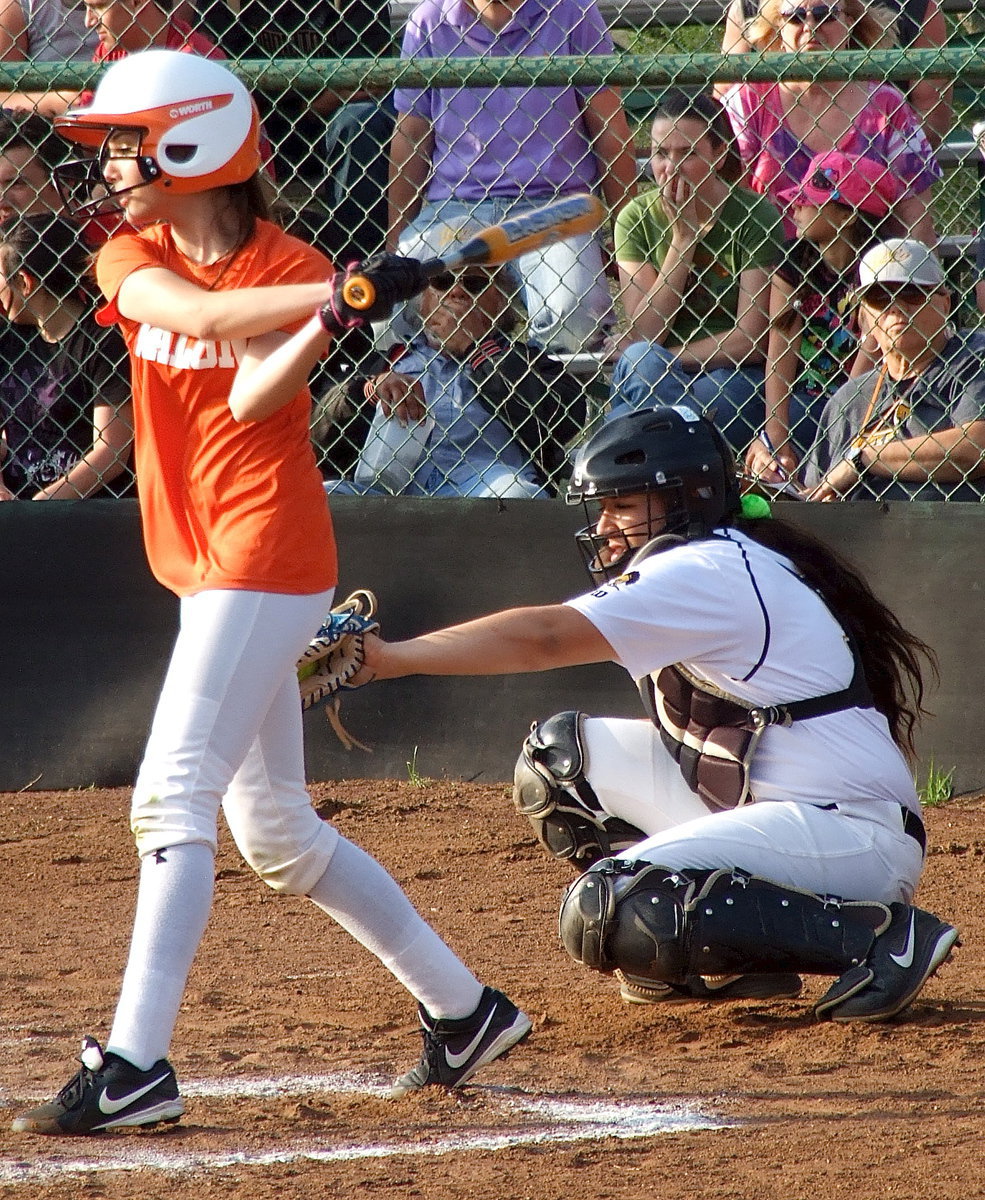 Image: Strike three, ball game! Alyssa Richards(9) pulls in the final strike of the game from pitcher Jaclynn Lewis as Italy gets the win after just two-and-a-half innings of play.