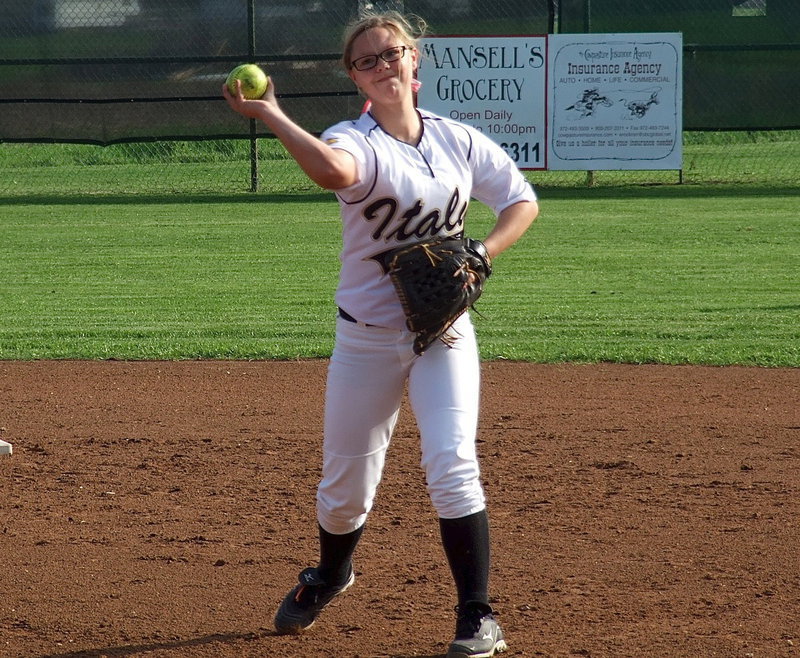 Image: Bailey Eubank(1) warms up at second base.