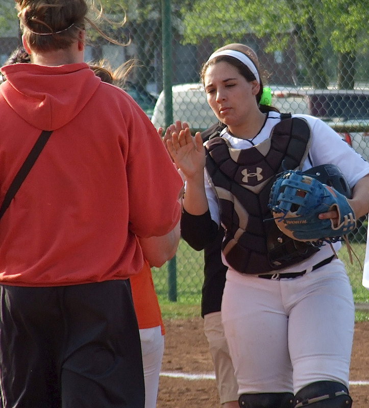 Image: A fierce competitor by nature, Alyssa Richards(9) displays good sportsmanship after the game.