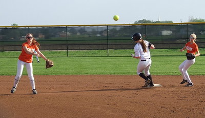 Image: Italy’s Madison Washington(2) reaches second but the Lady Eagles get the out at first base.