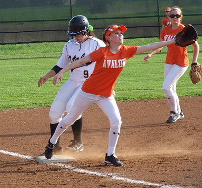 Image: Alyssa Richards(9) manages her second triple against Avalon.