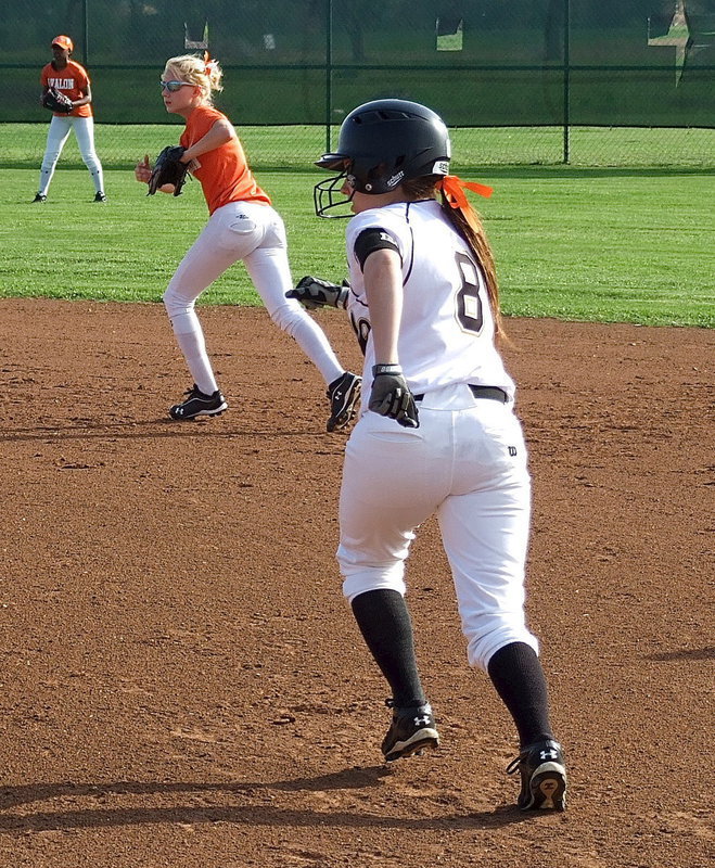 Image: Morgan Cockerham(8) races to second base.