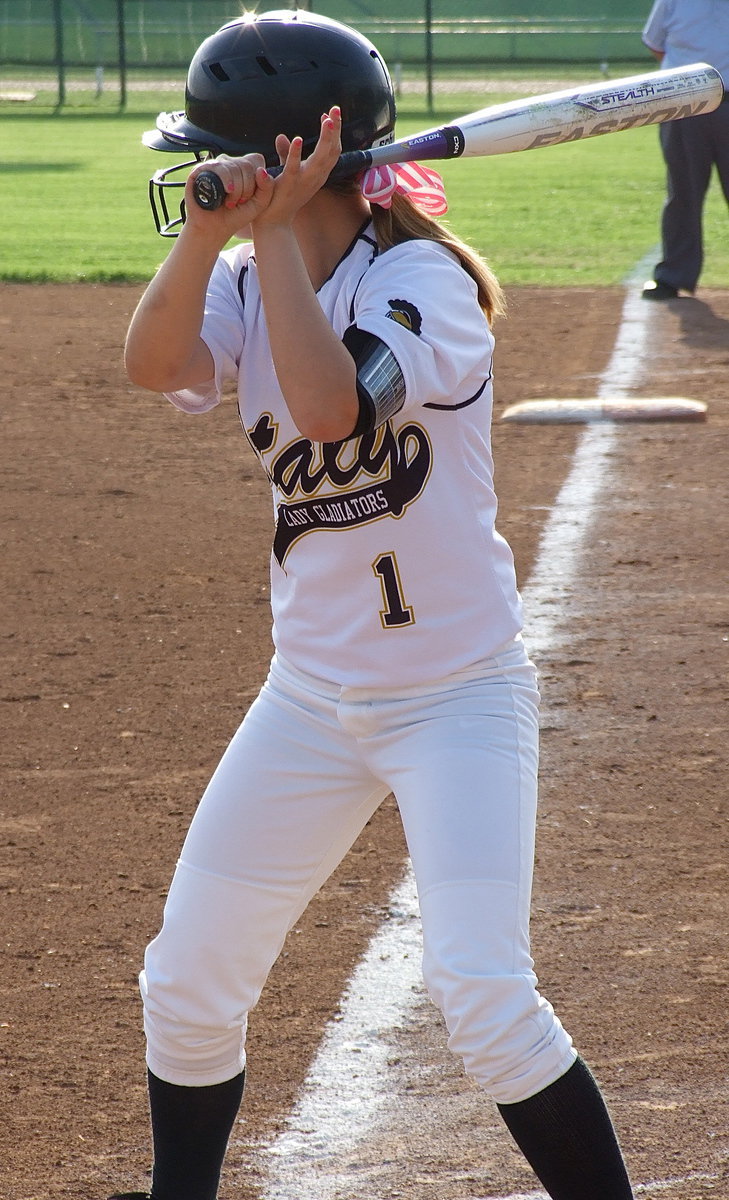 Image: Bailey Eubank(1) keeps a lose grip while waiting for the pitch.