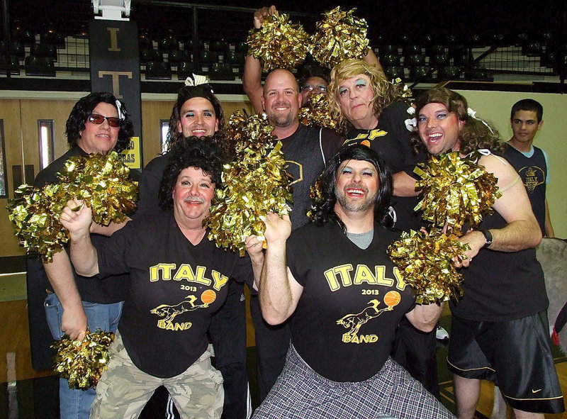 Image: The event’s cheerleaders surround Italy HS AD/HFC Hank Hollywood with their voluptuous pom-poms.