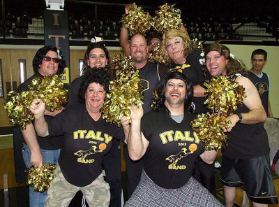 Image: The event’s cheerleaders surround Italy HS AD/HFC Hank Hollywood with their voluptuous pom-poms.