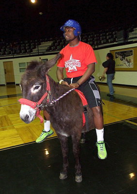 Image: Former Gladiator basketball star Jasenio Anderson is mounted and ready to make a play for his Guns-n-Hoses team.