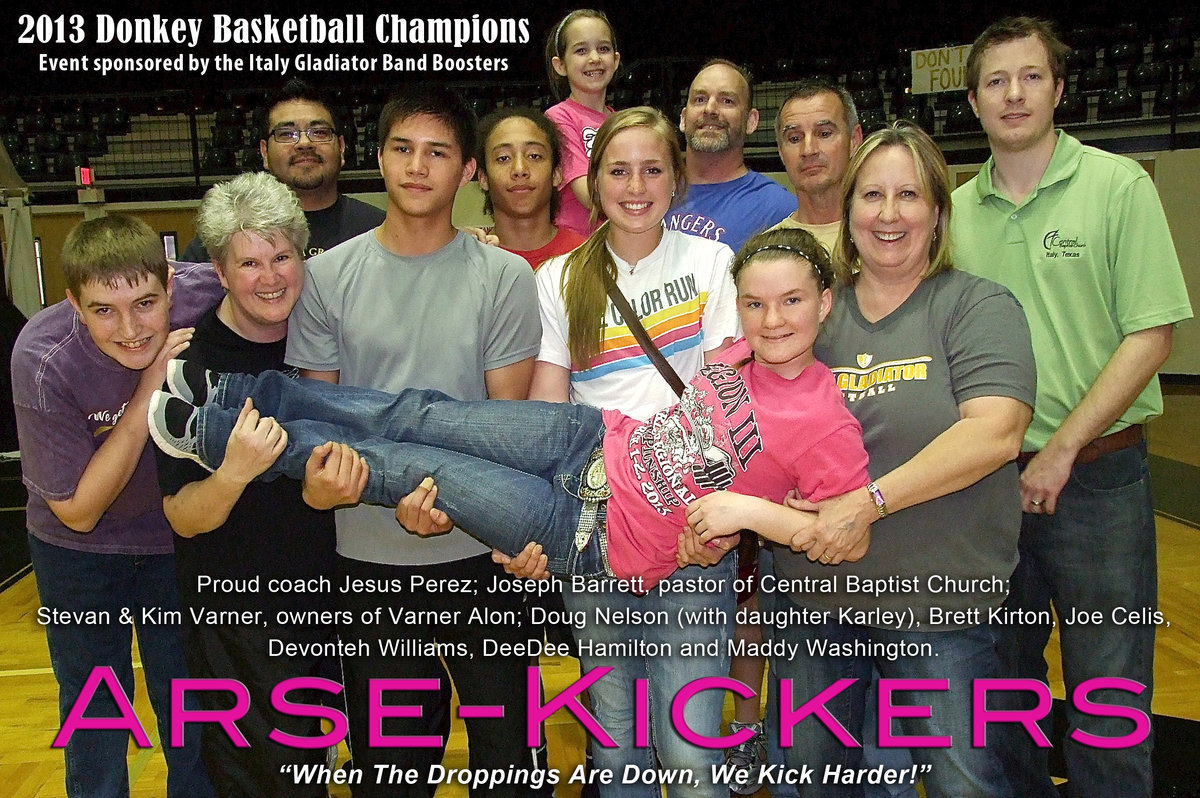 Image: This photo kicks arse! The Arse-Kickers become the 2013 Donkey Basketball Tournament Champions!! Team members are: (Back) Coach Jesus Perez, Devonteh Williams, Doug Nelson holding daughter Karley Nelson and Stevan Varner. (Middle): Brett Kirton, DeeDee Hamilton, Joseph Celis, Madison Washington and Kim Varner. (Front/Horizontal): Tara Wallis.