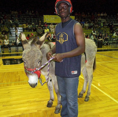 Image: Marvin Cox poses with his sidekick before the tournament.