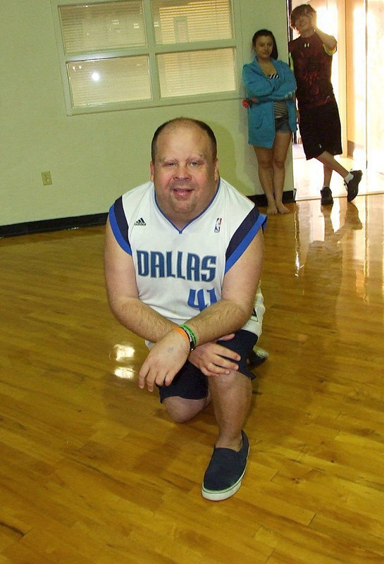 Image: Clint Holley(41) dazzled fans with his halftime performance by hitting a halfcourt shot on just his second attempt.