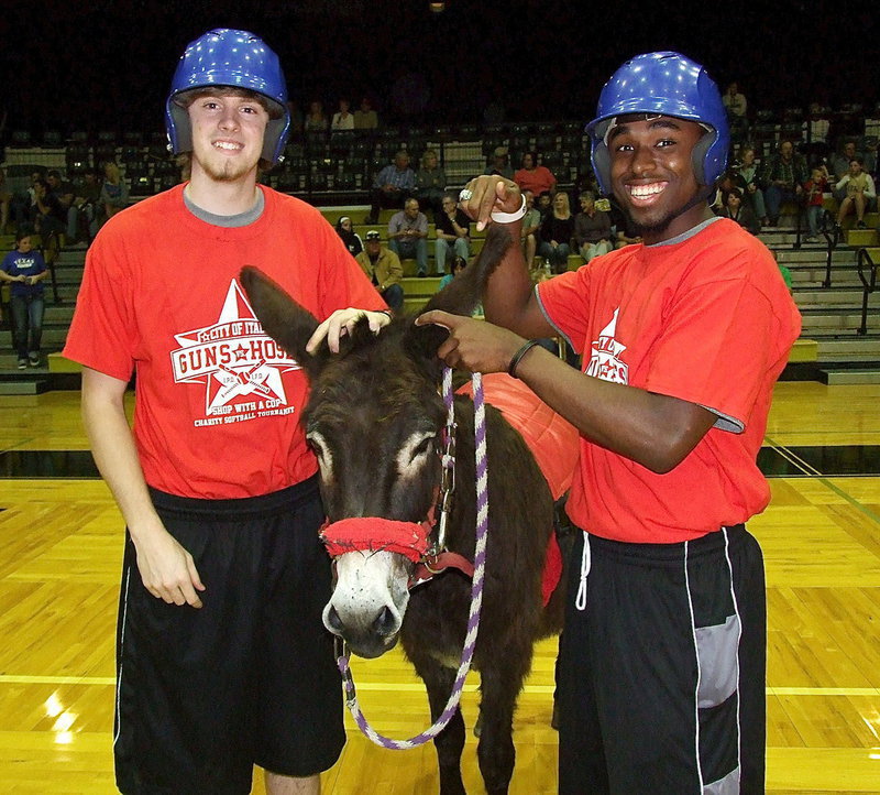 Image: Former Gladiator basketball teammates Clayton Campbell, ‘Heath Clemons’ and Jasenio Anderson return to the Coliseum for some donkey basketball.